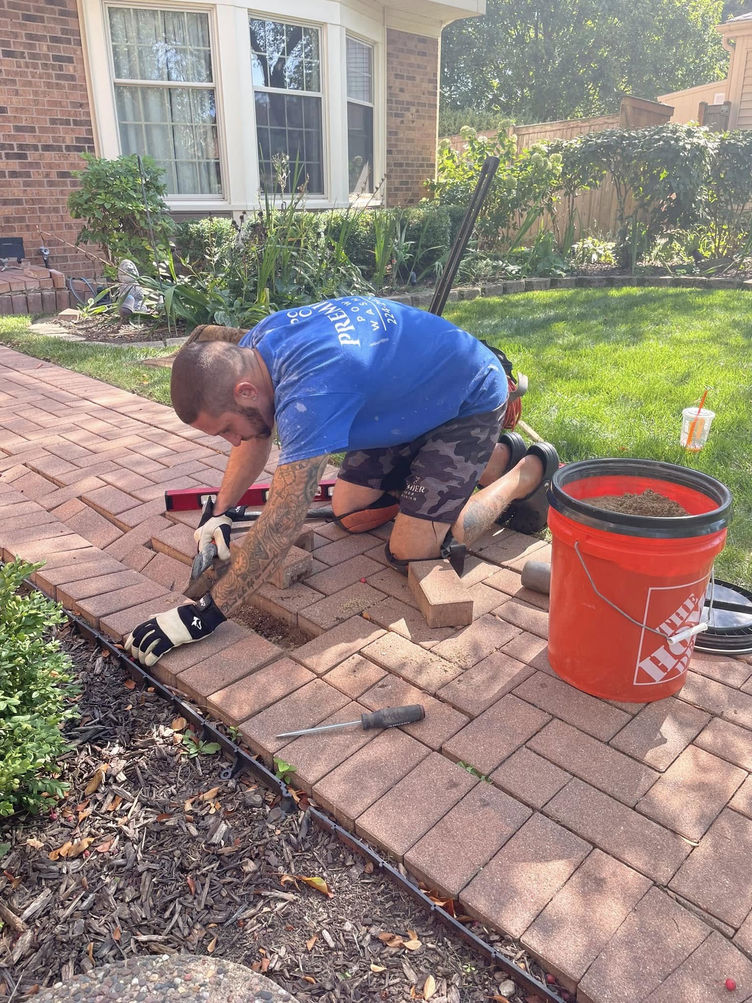 Paver restoration in progress — re-leveling
