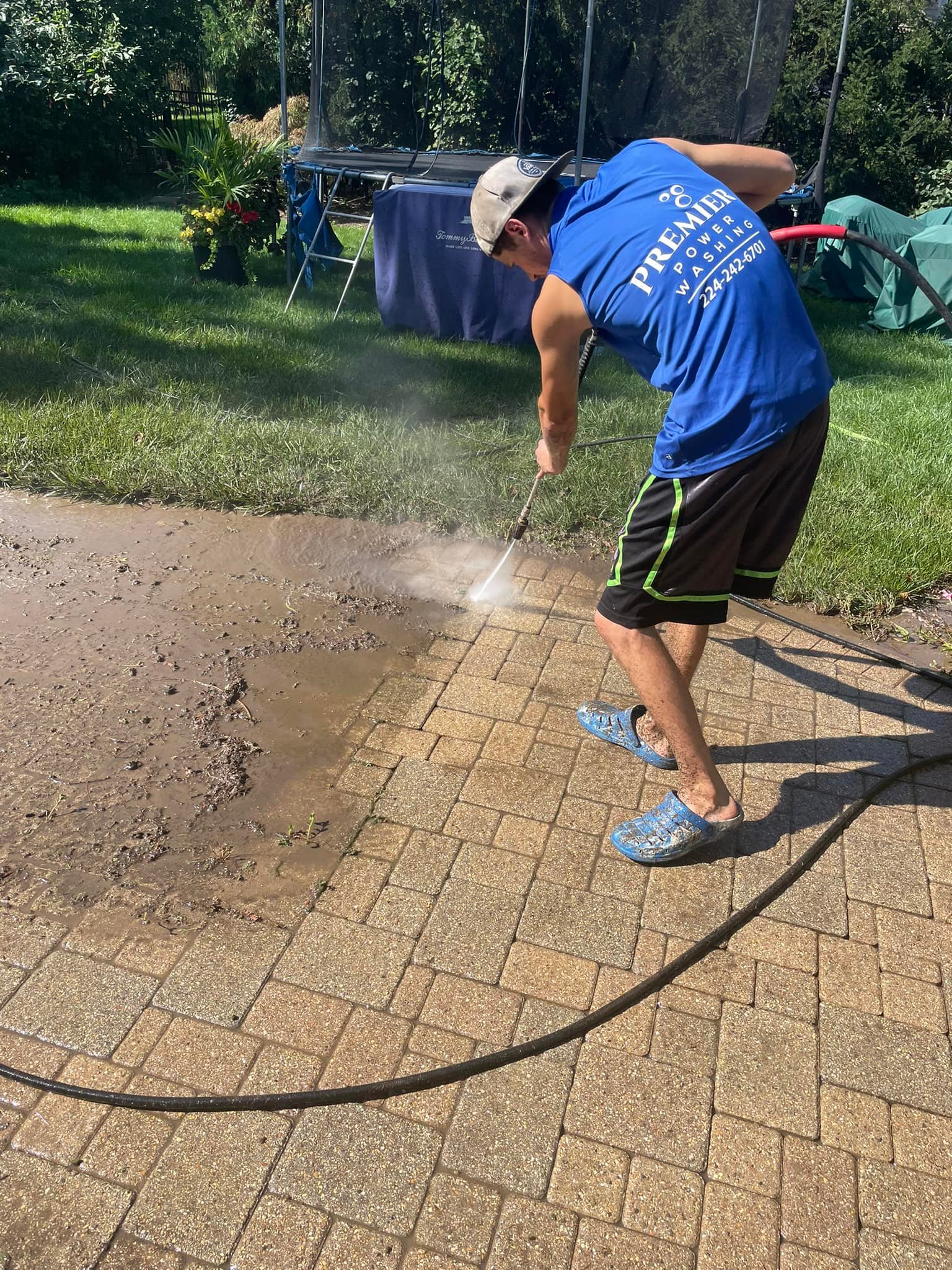 Power washing pavers on site